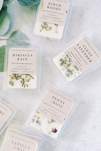 soy wax melts topped with herbal teas and botanicals