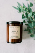 Load image into Gallery viewer, Birch Woods soy candle with crackle wooden wick in amber jar